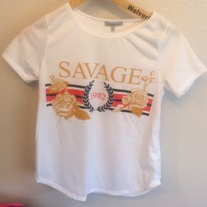 A white T-shirt that has writing on it